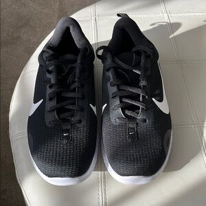 Nike Black Sneakers with Breathable Mesh Upper and Cushioned Sole